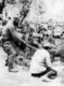 China: Rape of Nanking - Japanese soldier beheading Chinese victim.