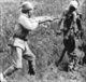China: Rape of Nanking - Japanese soldier bayoneting bound Chinese victim.