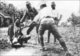 China: Rape of Nanking - Japanese soldiers bayoneting bound Chinese victim.