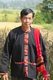 Thailand: Black Tai man in traditional dress, Ban Na Pa Nat Tai Dam Cultural Village, Loei Province